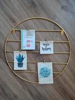 Gouden rond wandrek voor kaarten, Ophalen