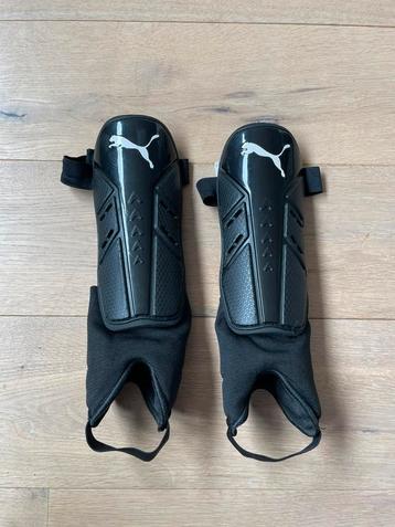 Puma scheenbeschermers zwart  beschikbaar voor biedingen