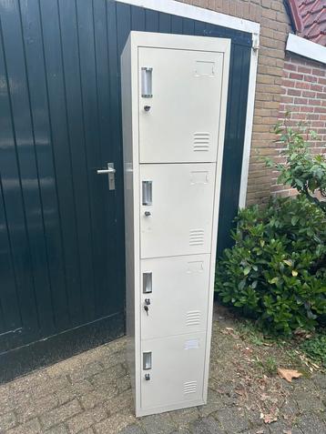 Smalle 4-deurs metalen lockerkast, grijs beschikbaar voor biedingen