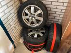 Volvo alu. Velgen met winterbanden: 6.5x16x52.2, Ophalen of Verzenden
