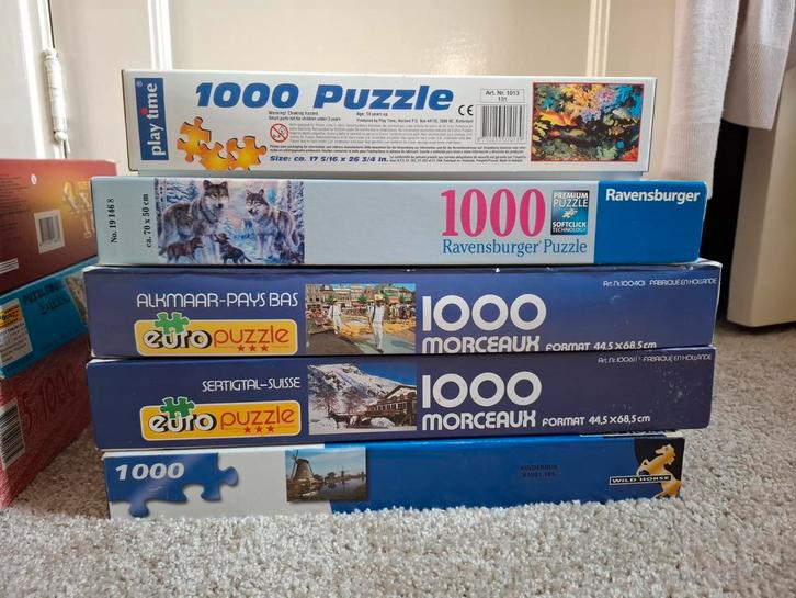 14 puzzels van 1000 stukjes, Hobby en Vrije tijd, Denksport en Puzzels, Gebruikt, 500 t/m 1500 stukjes, Ophalen of Verzenden