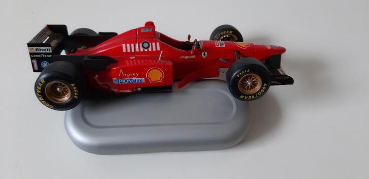 Formule 1 Ferrari F 310 modelauto 1996, Hobby en Vrije tijd, Modelauto's | Overige schalen, Zo goed als nieuw, Auto, Ophalen of Verzenden