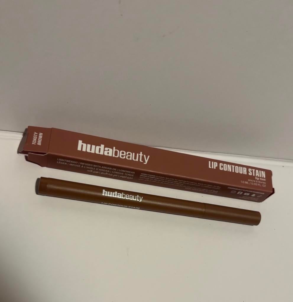 Huda Beauty Lip Stain - Toasty Brown, Sieraden, Tassen en Uiterlijk, Uiterlijk | Cosmetica en Make-up, Lippen, Bruin, Verzenden
