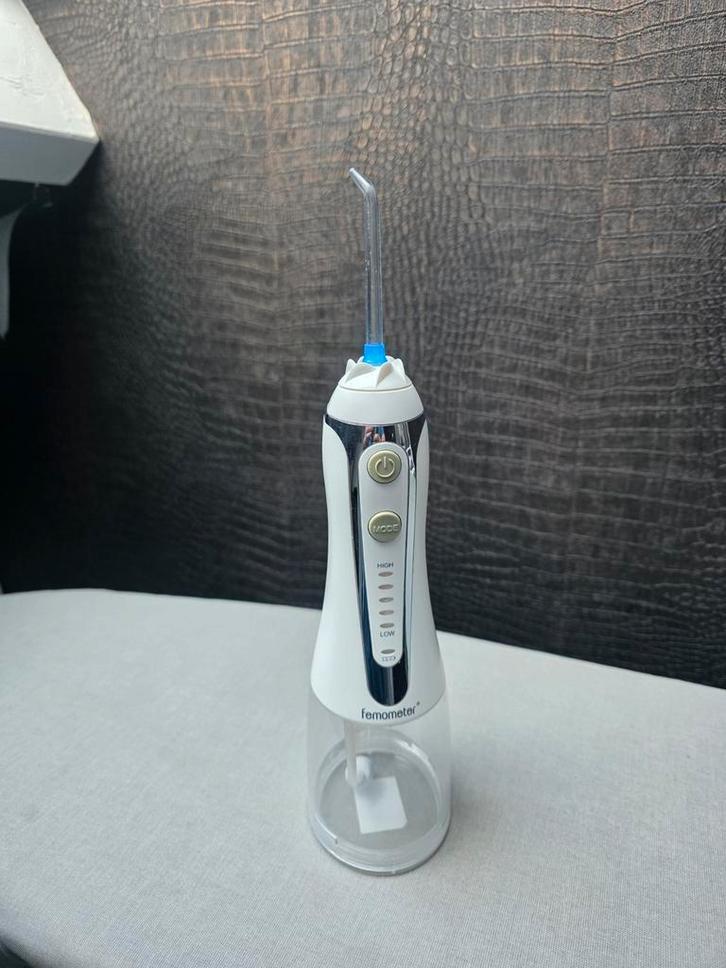 Femometer - Draadloze elektrische waterflosser, Sieraden, Tassen en Uiterlijk, Uiterlijk | Mondverzorging, Zo goed als nieuw, Overige typen