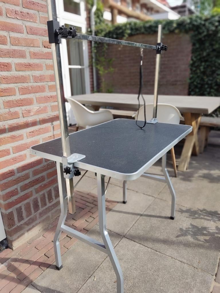 Trimtafel hond, Ophalen