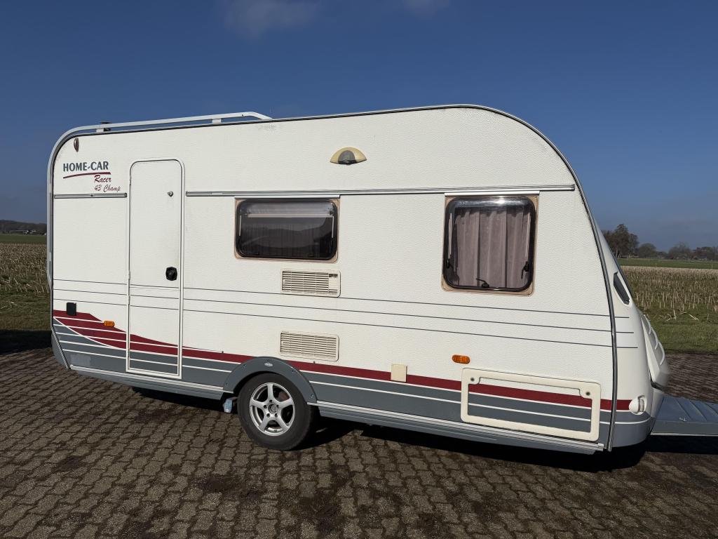 Home-Car Racer Champ 43 met mover en voortent, Caravans en Kamperen, Caravans, Home-car, Bedrijf, 750 - 1000 kg, Schokbreker