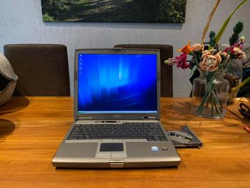Nette 14 inch Dell Windows XP laptop. Pentium M, goede accu beschikbaar voor biedingen
