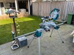 Makita LS1018L afkortzaag met WST06 onderstel, Ophalen, 70 mm of meer, Zo goed als nieuw, Afkortzaag