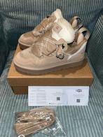 Ugg Lowmel Sand 40, UGG, Verzenden, Beige, Nieuw