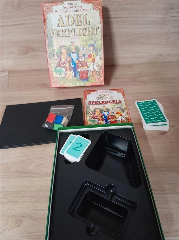 Adel Verplicht - s1402, Hobby en Vrije tijd, Gezelschapsspellen | Bordspellen, Zo goed als nieuw, Ophalen of Verzenden