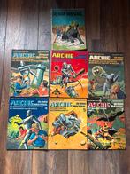 Te koop stripboeken de man van staal en Archie, Meerdere stripboeken, Ophalen of Verzenden, Gelezen, Bert Bus