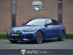 BMW i4 M50 xDrive Gran Coupé | Carbon | Frozen Portimao, Auto's, BMW, Stof, Gebruikt, Met garantie (alle), Blauw