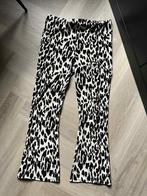 Flared broek met panterprint - Maat 42/44, Ophalen of Verzenden, Zo goed als nieuw, Maat 42/44 (L)