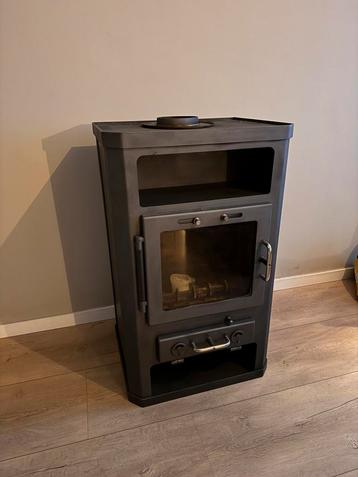 Houtkachel speksteen beschikbaar voor biedingen