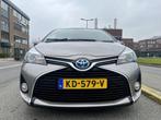 Toyota Yaris Hybrid 2015 Bruin, 4 cilinders, Bruin, 49 €/maand, Metallic lak