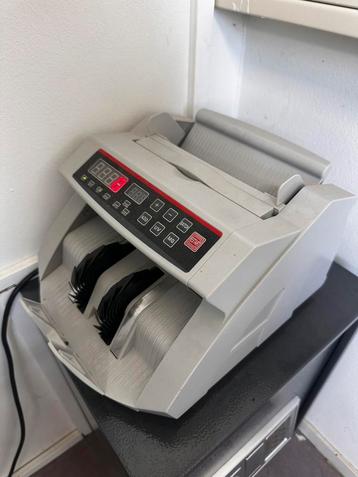 Geldtelmachine beschikbaar voor biedingen