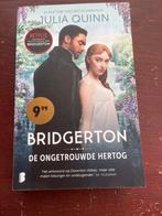 Bridgerton: De Ongetrouwde Hertog - Julia Quinn, Ophalen of Verzenden, Zo goed als nieuw, Nederland