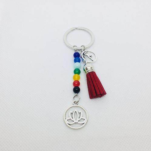 Chakra sleutelhanger met lotus en rood suède kwastje, Verzamelen, Sleutelhangers, Nieuw, Ophalen of Verzenden