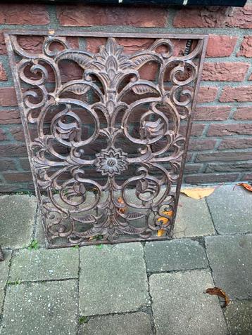 Gietijzeren deurmat beschikbaar voor biedingen