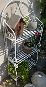 Sierlijk gietijzer tuinkastje, Ophalen