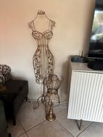 Brocante metalen paspop, Ophalen