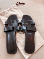 Zwarte Hermes Oran slippers - Maat 38 *Origineel, Kleding | Dames, Schoenen, Slippers, Zwart, Ophalen of Verzenden, Gedragen