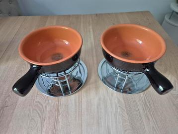 2 kaasfondue pannen.  beschikbaar voor biedingen