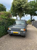 Land Rover Discovery 2.5 TDI Comm 4WD AUT KAT 1997, Auto's, Automaat, Stof, Land Rover, Beige