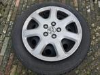 Winterbanden 16 inch op stalen velgen met wieldoppen, Ophalen