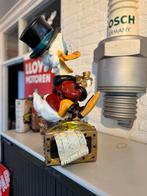 Dagobert Duck beeld op schatskist, Ophalen