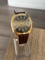 Herenhorloge vintage jaren 70, Ophalen of Verzenden, Zo goed als nieuw, Zwart, Android