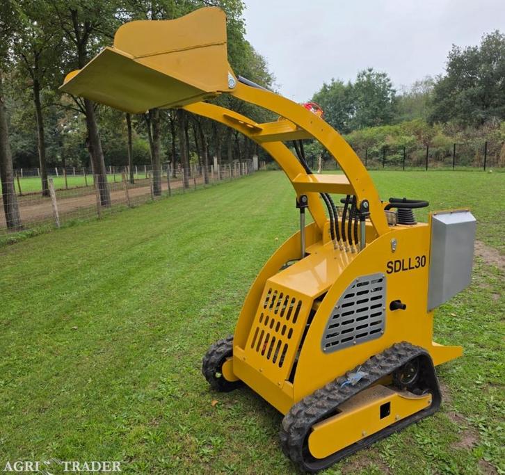 Schranklader skidster minishovel, Zakelijke goederen, Machines en Bouw | Kranen en Graafmachines