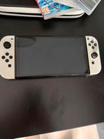 Switch oled compleet met twee docks en twee spellen, Spelcomputers en Games, Spelcomputers | Nintendo Switch, Ophalen of Verzenden