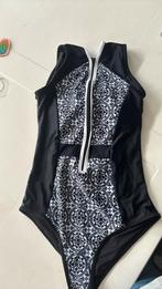 Zwart wit badpak met rits. Slank afkledend model, Kleding | Dames, Badmode en Zwemkleding, Verzenden, Nieuw, Zwart, Badpak