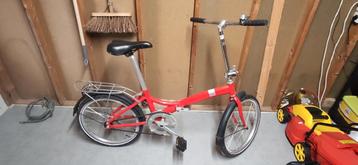 Compacte rode vouwfiets beschikbaar voor biedingen