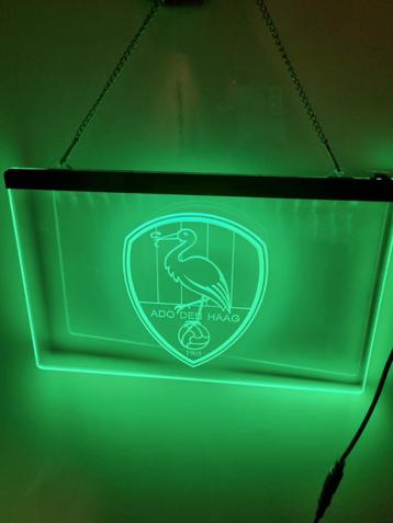 Ado Den Haag licht ophang bordje beschikbaar voor biedingen