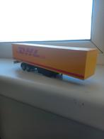 Dhl trailer nieuw uit vitrine kast!, Hobby en Vrije tijd, Modelauto's | 1:50, Ophalen of Verzenden, Bus of Vrachtwagen, Zo goed als nieuw