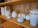 Servies met goudrand, Ophalen