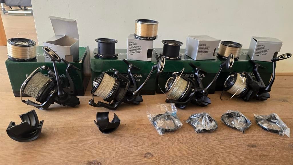 4 x Shimano ultegra 14000 XTD, 5 reservespoelen,  lineguards, Ophalen of Verzenden, Molen