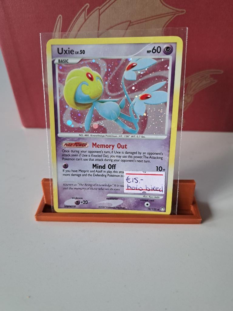 Uxie 18/123 Holo Bleed	 € 15,00, Ophalen of Verzenden, Zo goed als nieuw, Losse kaart