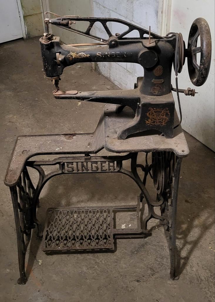 Singer leer naaimachine., Ophalen