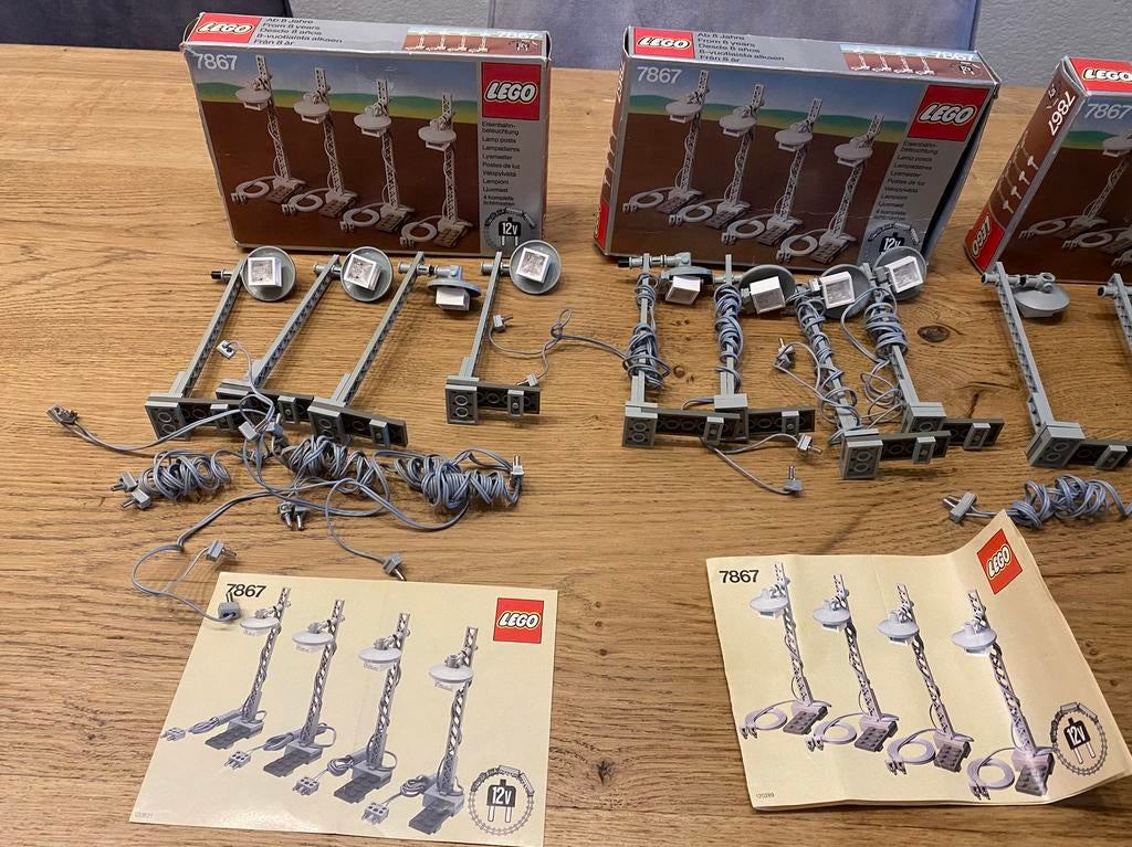 Lego 12v trein lantaarnpalen 7867 4 sets met doos, Lego, Ophalen of Verzenden, Zo goed als nieuw, Inclusief doos