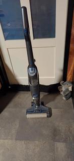 Stofzuiger met dweil op accu, Ophalen