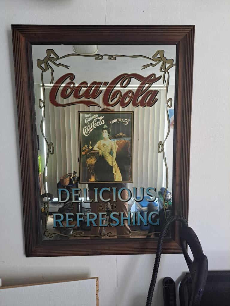 Coca Cola spiegel, Ophalen