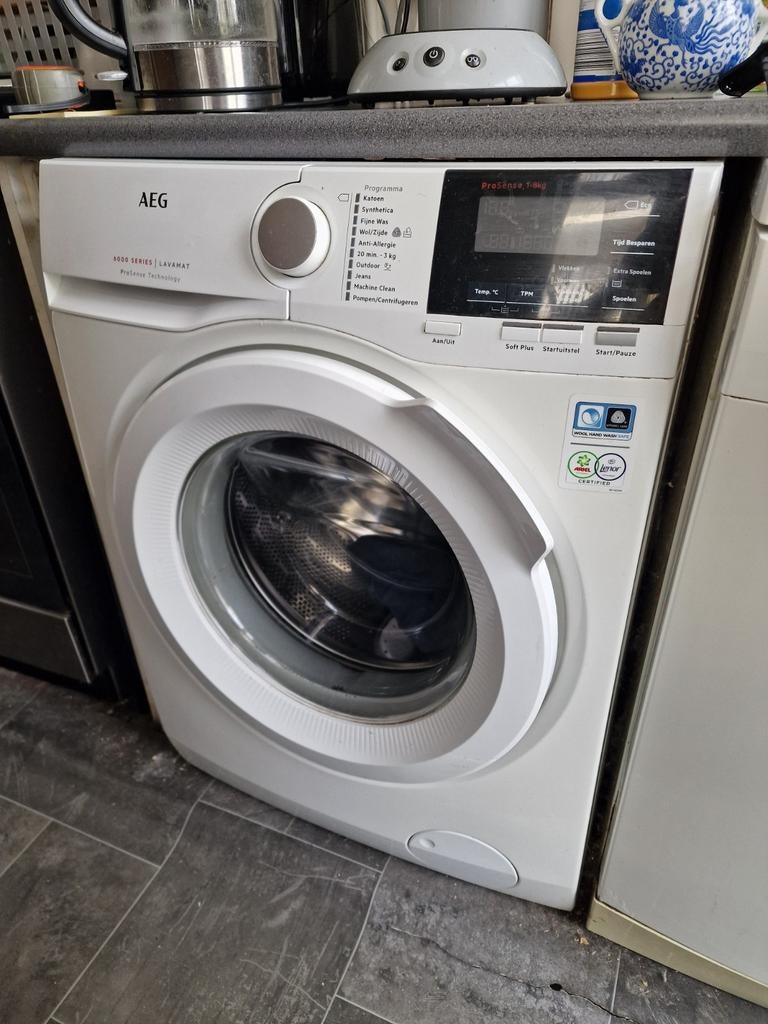 AEG 6000 Series Lavamat ProSense Wasmachine, Ophalen