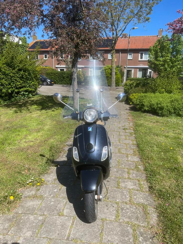 Vespa LX50, Fietsen en Brommers, Ophalen, Gebruikt, Maximaal 45 km/u, Benzine