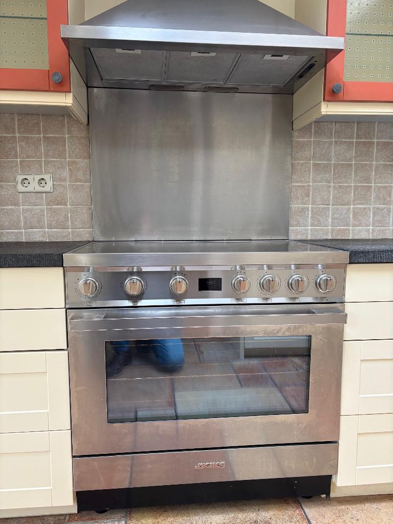 SMEG Inductie fornuis CPF9IPX en afzuigkap, Ophalen, 60 cm of meer, Zo goed als nieuw, Energieklasse A of zuiniger