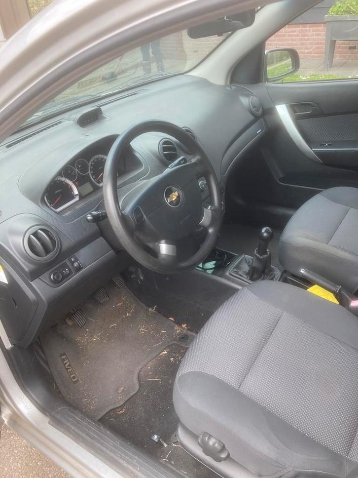 Chevrolet Aveo 1.2 16V 5D 2010 Grijs, Auto's, Chevrolet, Particulier, Aveo, Dodehoekdetectie, Benzine, C, Hatchback, Handgeschakeld