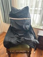 Schootkleed scootmobiel of rolstoel, Ophalen