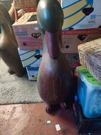 Houten beelden, Ophalen